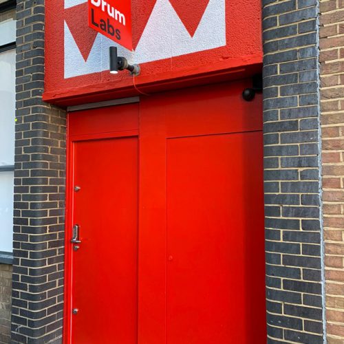 Red steel doors and internal window shutter